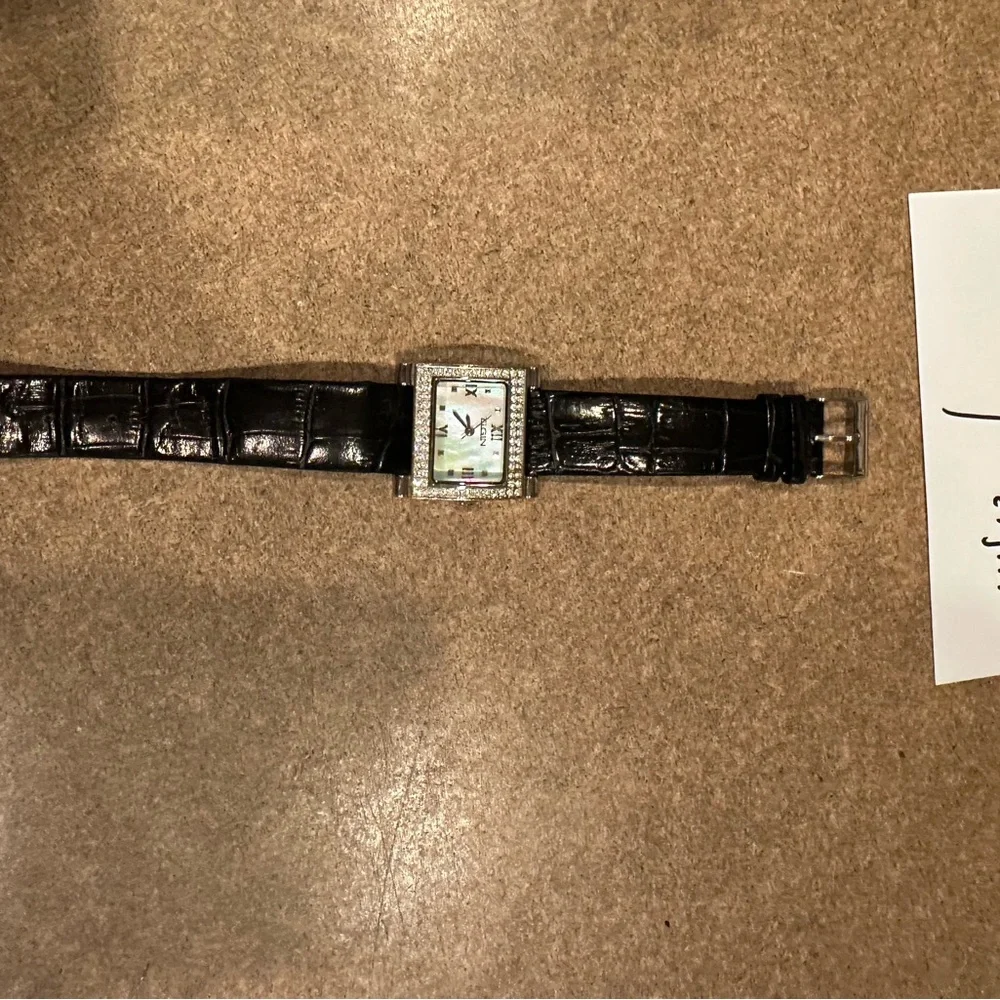 Elgin watch with mother of pearl face